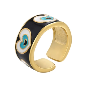 Detailed macro view of wide gold band ring featuring black enamel heart evil eye patterns