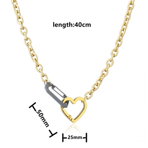 Detail view showing industrial chain necklace with 50mm carabiner and heart clasp