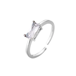 Detailed macro view of an adjustable open ring featuring a clear emerald cut cubic zirconia