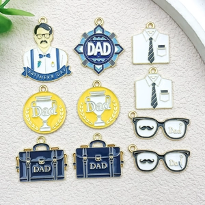 Detailed close-up of Father's Day alloy charms featuring briefcase and shirt designs