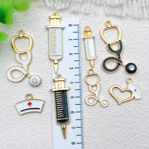DIY medical theme alloy charms set with stethoscope and syringe for jewelry making