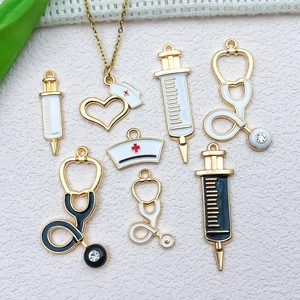 DIY medical charms set featuring gold alloy stethoscopes, syringes and nurse hats
