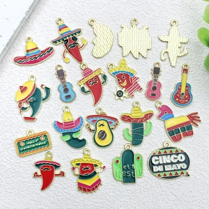 Detailed macro view of colorful Mexican style enamel chili and cactus alloy charms