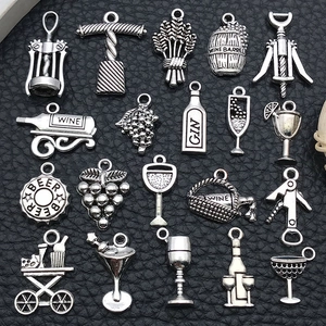 20pcs set of antique silver wine charms including barrels openers and bottles on black leather