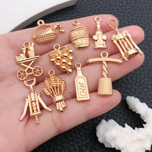 Set of 10 golden wine theme charms including bottle opener and barrel for DIY jewelry