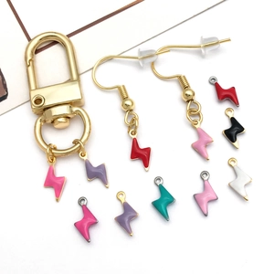 Close-up of lightning bolt charms with colorful enamel finish for DIY jewelry making
