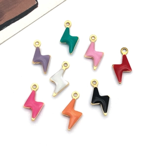 Macro detail of lightning bolt charms in multiple enamel colors for DIY jewelry making