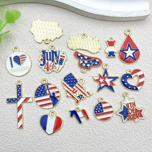 Flat lay of USA Independence Day themed enamel alloy charms for DIY jewelry making
