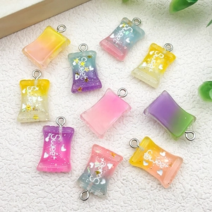 Colorful resin candy pendants with Sweet text and glitter sequins for DIY crafts