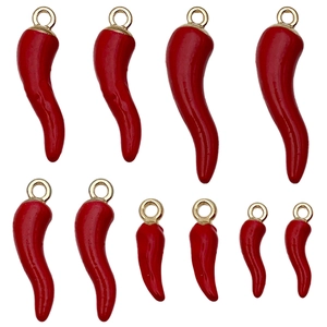 Set of red enamel chili pepper pendants in various sizes with golden metal rings