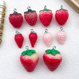 Detailed set of 10 DIY resin strawberry charms in various red and pink gradients with hooks