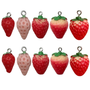 Set of ten resin strawberry charms in five pink shades for DIY jewelry making