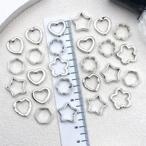 Hohle Herz- und Sternperlen aus Legierung für DIY-Schmuck mit silbernem Metallic-Finish