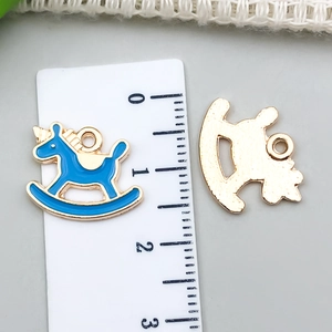 Sky blue enamel unicorn charm with gold alloy base for DIY jewelry making, 1.8cm wide