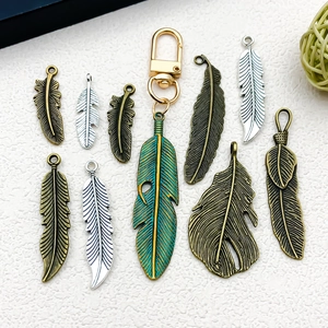 Zinc alloy feather leaf charms in antique bronze and silver for DIY jewelry making