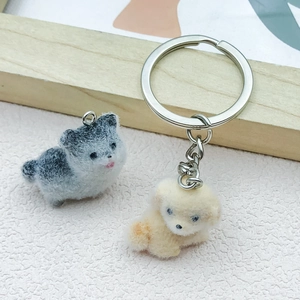 Cute flocked resin puppy dog charms with silver keychain rings in grey and beige