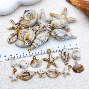Beige acrylic sea shell and starfish pendants for DIY jewelry making with ruler scale
