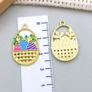 Detailed size view of enamel Easter basket charms with colorful eggs and gold plating