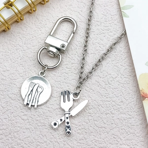 Vintage silver cutlery pendant set featuring spoon fork knife charms for DIY jewelry making