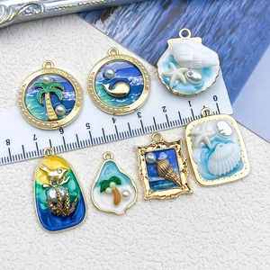 Pendenti in lega serie oceano blu con balene e conchiglie per la creazione di gioielli
