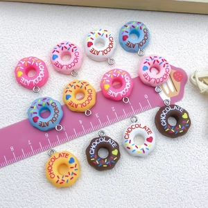Colorful resin donut pendants for DIY jewelry making including earrings and necklaces