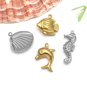 Detailed set of gold and silver ocean themed pendants for DIY bracelet jewelry making