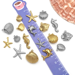 Mixed ocean sea creatures charms in gold and silver stainless steel with ruler scale