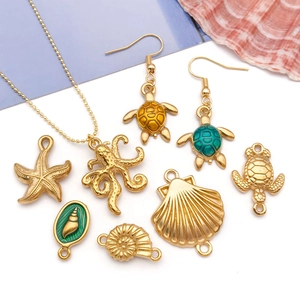 Parure bijoux créatures marines avec collier poulpe, boucles tortue et divers pendentifs