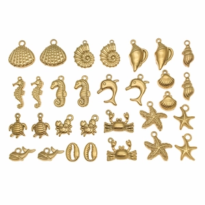Goldene Edelstahl Anhänger Set Meerestiere wie Seestern und Muschel für DIY Schmuckherstellung