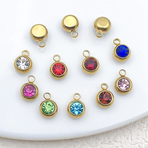 Macro view of colorful crystal birthstone pendants for DIY jewelry making