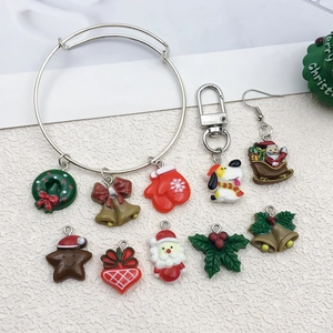 Kit ciondoli natalizi in resina con Babbo Natale e fiocchi per creazione di gioielli