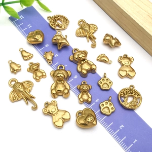 Golden stainless steel animal charms for DIY jewelry making with measurement scale