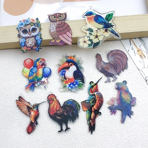 Colorful acrylic bird pendants featuring owls and parrots for DIY jewelry making accessories