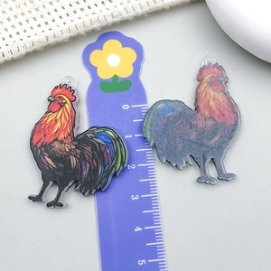 Detailed view of 4cm acrylic rooster charm with colorful pattern and DIY top hole