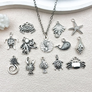 Detailed view of antique silver ocean animal charms for DIY necklace and bracelet crafting