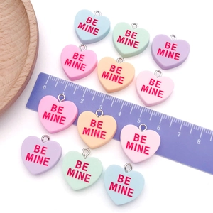 Colorful resin heart pendants with BE MINE text for DIY jewelry and necklaces