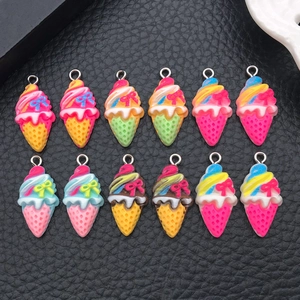 Detail of DIY resin ice cream charms with metal eyelet pins for jewelry making