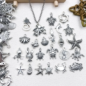 Antique silver sea life alloy pendants including starfish and turtle charms for DIY jewelry