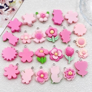 Set of 24 pink resin flower pendants including roses and daisies for DIY jewelry making