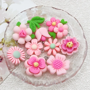 Pink resin flower charms with sunflower and rose designs for DIY jewelry making