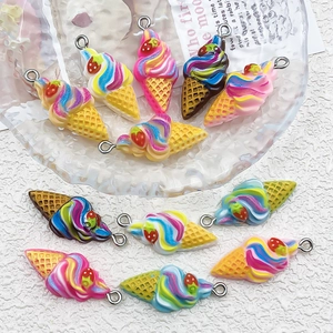 Detailed view of colorful resin ice cream cone pendants with metal rings for DIY jewelry