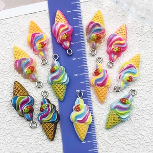 Colorful resin ice cream cone charms with strawberry detail and metal hanging loops