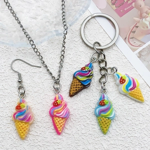 Detailed view of handmade resin ice cream charms for necklaces, earrings and keychains