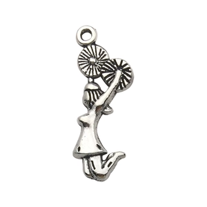 Detail of antique silver cheerleader charm pendant with textured vintage metal finish