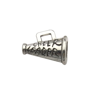 Detailed close-up of antique silver megaphone pendant with Cheer Leader engraving