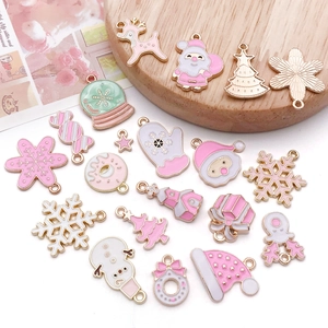 Pink and white enamel Christmas charms with gold accents for DIY jewelry making