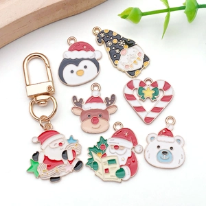 Detailed set of Christmas alloy enamel charms featuring reindeer, Santa and festive themes