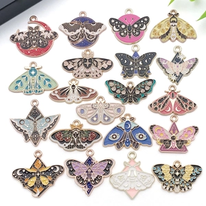 Set of 20 assorted enamel butterfly and moth charms with mystical starry patterns for DIY