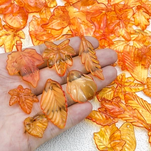 Translucent orange acrylic maple leaf charms for DIY jewelry making and crafts