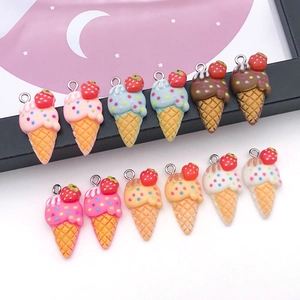 Detailed view of colorful resin strawberry ice cream cone pendants for DIY jewelry making